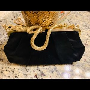 BCBGMaxAzria Black silk clutch gold snake hardware